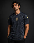 Special Edition Kit M10, featuring a black design with a golden